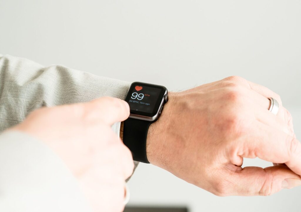 Wearable health monitors track vital signs for proactive health management.