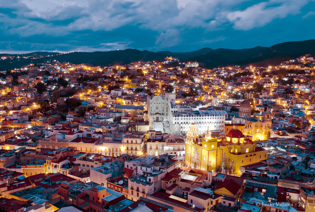 A aerial picture of Guanajuato with a church in view.