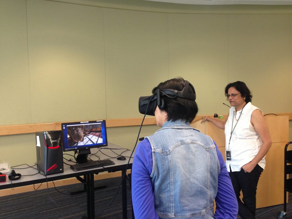 An elder woman having a senior VR entertainment session.