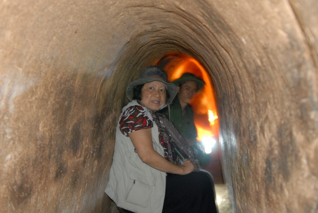 An image of seniors visiting the Cho Chi Tunnel.