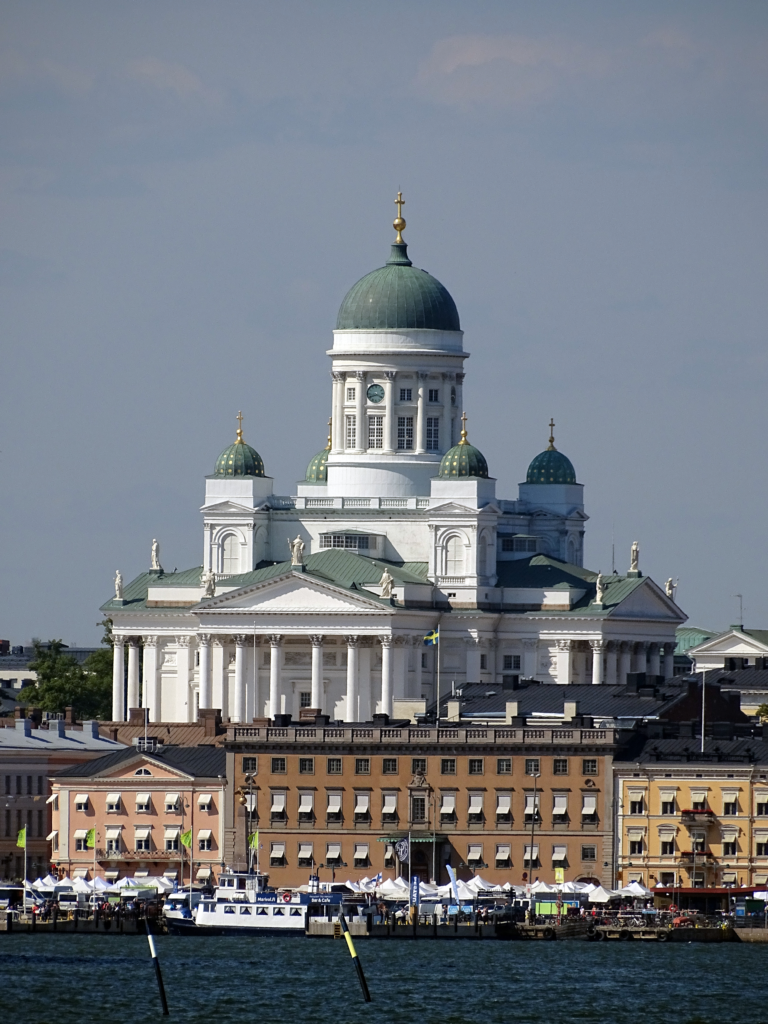 A photo of the Helsinki Cathedral taken from the waters.