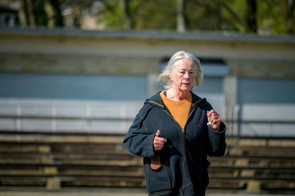An older person jogging