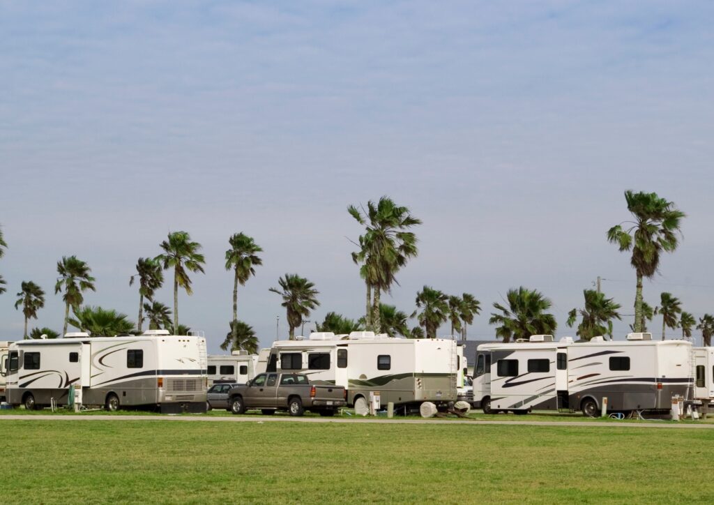An RV park with the same RVs all in a row