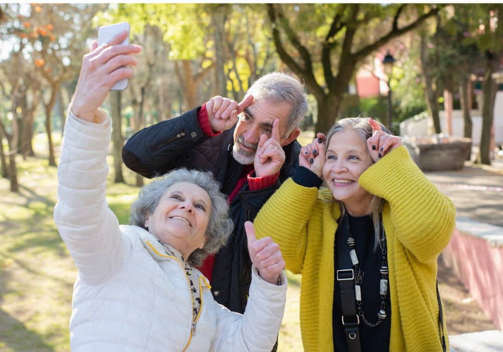 Retirees taking a selfie together