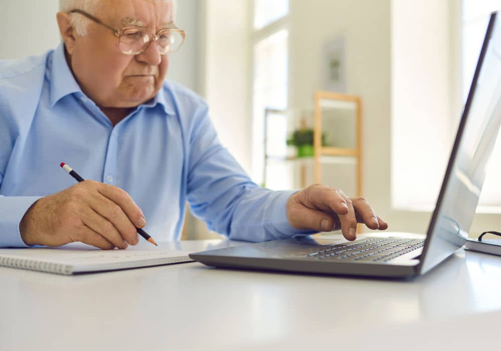 A retiree learning new skills through online courses