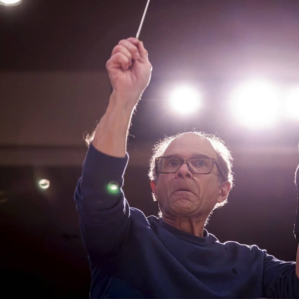 Image: Ohio conductor Rand Laycock back at the podium. A new implant in his brain has nearly erased the tremors that once held him back. - Courtesy of Cleveland Clinic