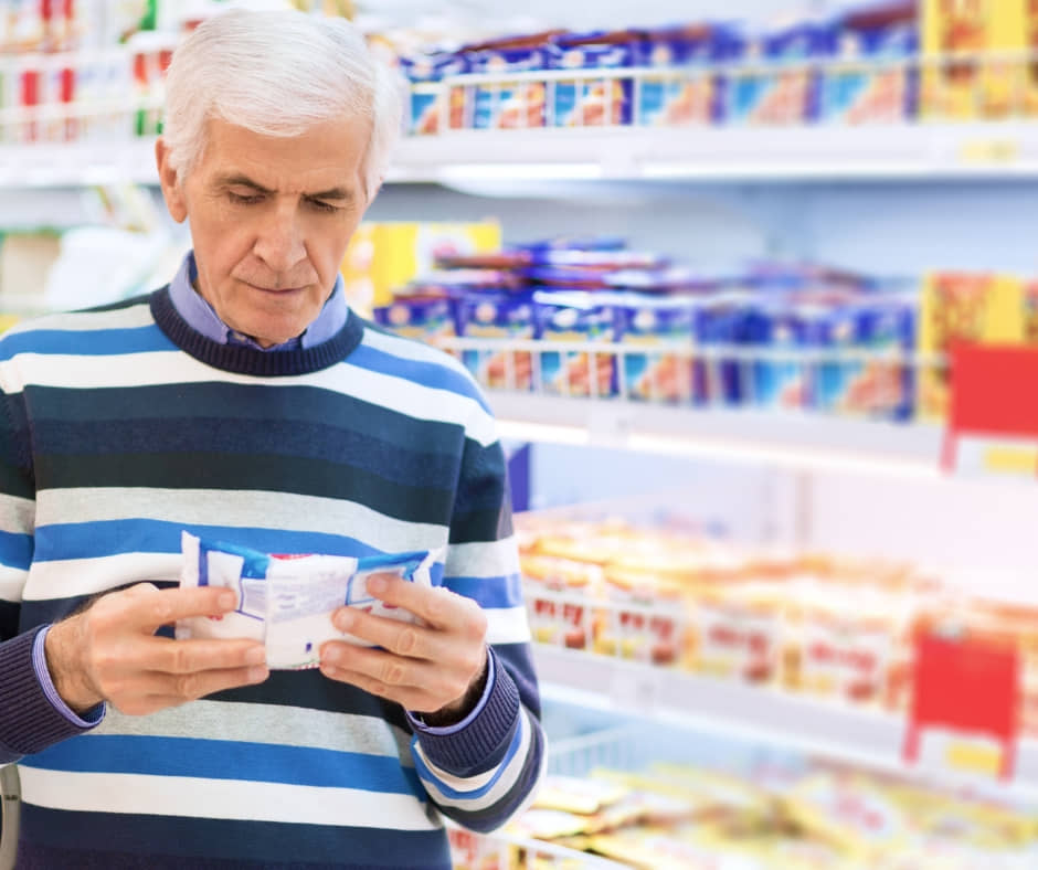 A senior shopping at a grocery store